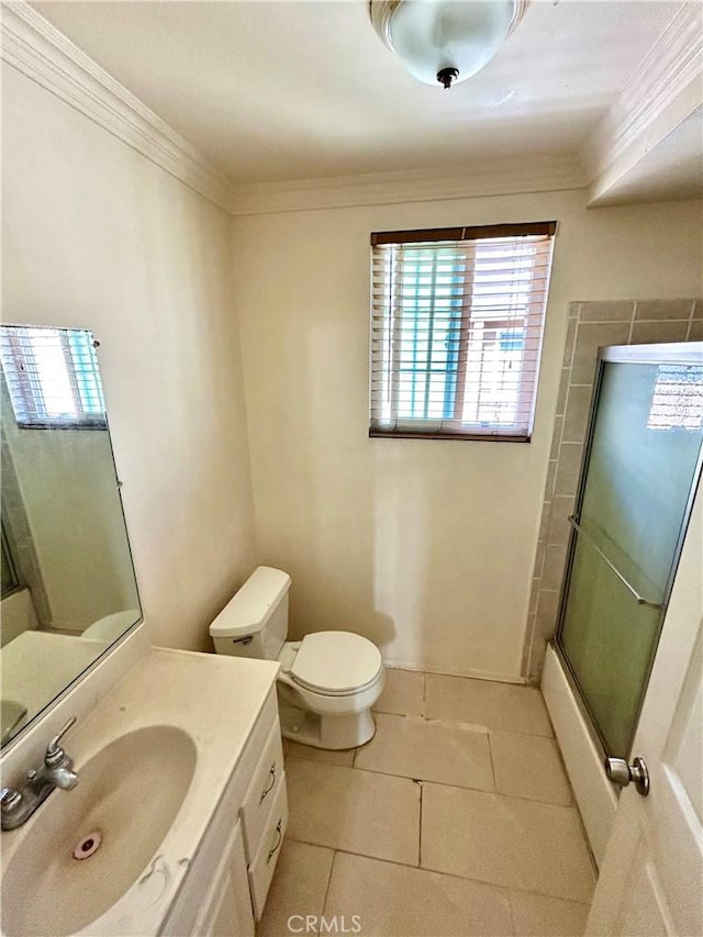 2635 W Monte Carlo Dr Unit 42, Santa Ana, CA 92706 - full bath with ornamental molding, a shower with shower door, toilet, tile patterned flooring, and vanity