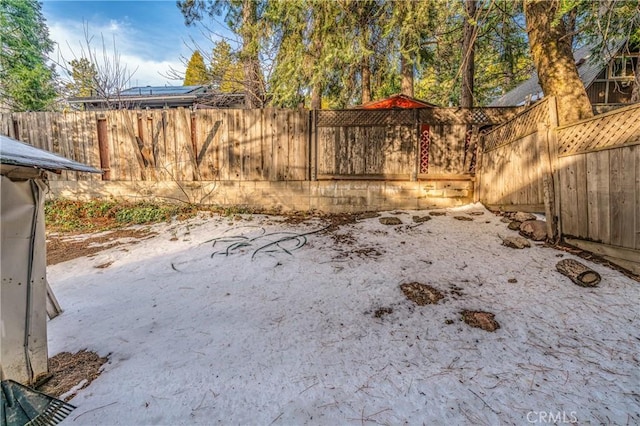 view of yard with a fenced backyard