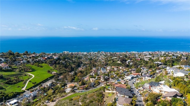 birds eye view of property featuring a water view and a residential view