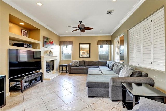 living room with crown molding, recessed lighting, ceiling fan, and visible vents