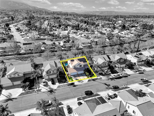 aerial view with a residential view and a mountain view