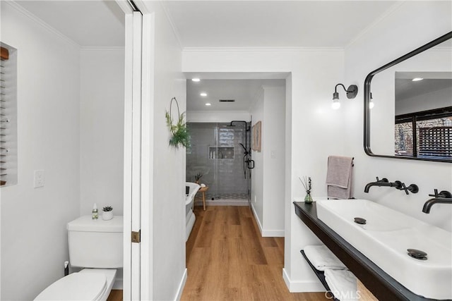 28886 Cedar Dr, Lake Arrowhead, CA 92352 - full bathroom with wood finished floors, crown molding, a stall shower, toilet, and vanity