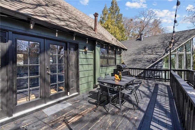 28886 Cedar Dr, Lake Arrowhead, CA 92352 - wooden deck featuring outdoor dining area, french doors, and area for grilling