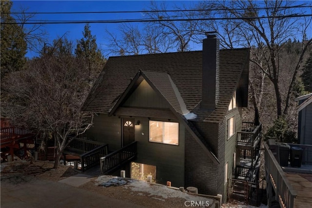 28886 Cedar Dr, Lake Arrowhead, CA 92352 - view of front of property with stairway and a chimney