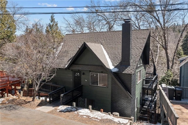 28886 Cedar Dr, Lake Arrowhead, CA 92352 - view of front of home with stairs and a chimney