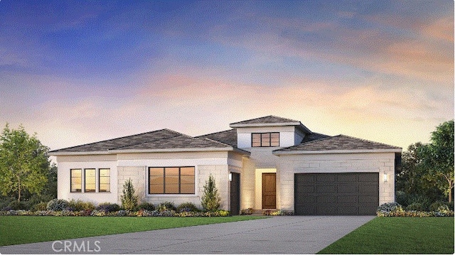 11851 Red Hawk Ln, Porter Ranch, CA 91326 - view of front facade featuring a garage, concrete driveway, and a front yard