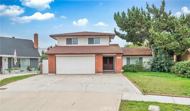 traditional home with a front lawn, an attached garage, driveway, and stucco siding