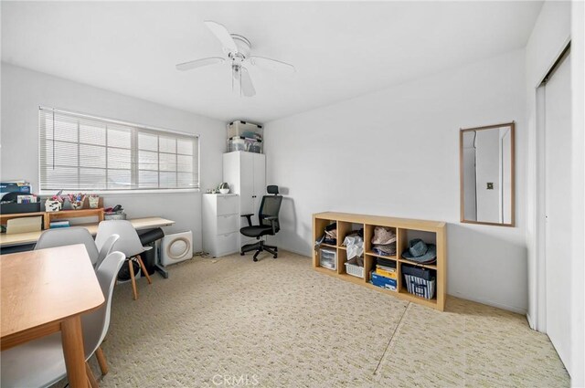 office space featuring ceiling fan