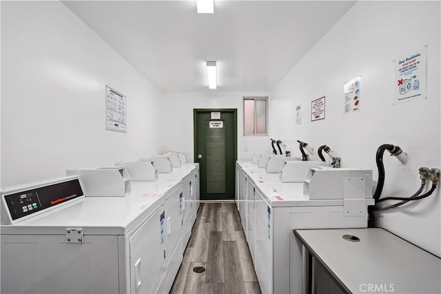 5301 Balboa Blvd Unit M4, Encino, CA 91316 - shared laundry featuring washing machine and dryer and light wood-style floors
