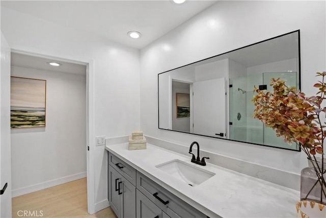 5301 Balboa Blvd Unit M4, Encino, CA 91316 - bathroom featuring vanity, an enclosed shower, wood finished floors, recessed lighting, and baseboards