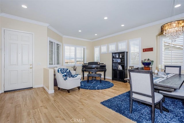 office space with ornamental molding, recessed lighting, wood finished floors, a notable chandelier, and baseboards