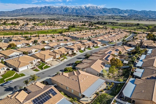 drone / aerial view with a mountain view and a residential view