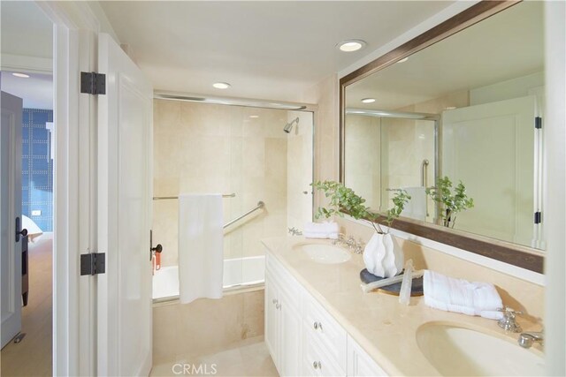 13 Lagunita Dr, Laguna Beach, CA 92651 - full bath featuring double vanity, recessed lighting, combined bath / shower with glass door, and a sink