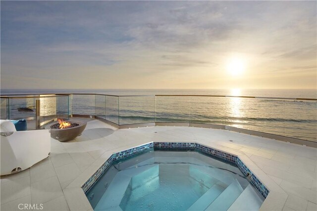 13 Lagunita Dr, Laguna Beach, CA 92651 - view of pool featuring an in ground hot tub, a water view, and an outdoor fire pit