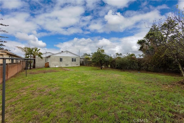 view of yard with fence