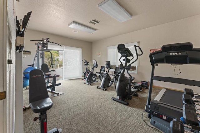 6330 Genesee Ave Unit 119, San Diego, CA 92122 - workout area featuring carpet floors and a textured ceiling