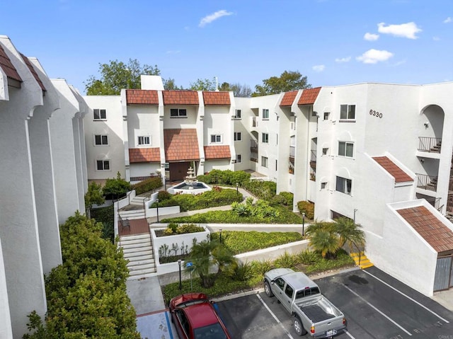 6330 Genesee Ave Unit 119, San Diego, CA 92122 - view of building exterior with uncovered parking