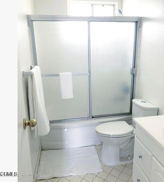 544 Salem St, Glendale, CA 91203 - bathroom featuring tile patterned floors, toilet, vanity, and shower / bath combination with glass door
