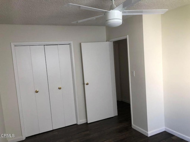 544 Salem St, Glendale, CA 91203 - unfurnished bedroom featuring a textured ceiling, dark wood finished floors, a closet, baseboards, and ceiling fan