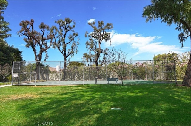 49 Country Ln, Rolling Hills Estates, CA 90274 - view of tennis court with fence and a lawn