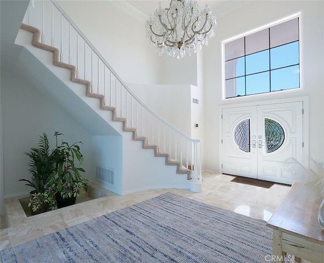 49 Country Ln, Rolling Hills Estates, CA 90274 - foyer with visible vents, stairway, a high ceiling, french doors, and a notable chandelier