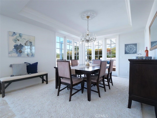49 Country Ln, Rolling Hills Estates, CA 90274 - dining area with baseboards, light colored carpet, a notable chandelier, and a raised ceiling
