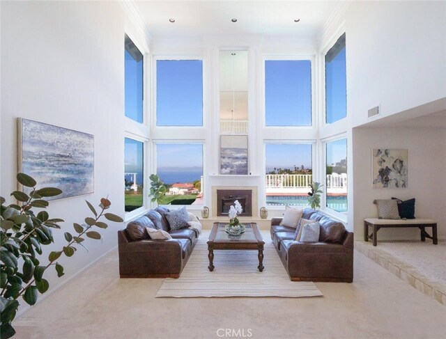 49 Country Ln, Rolling Hills Estates, CA 90274 - living area with a high ceiling, carpet, crown molding, and visible vents