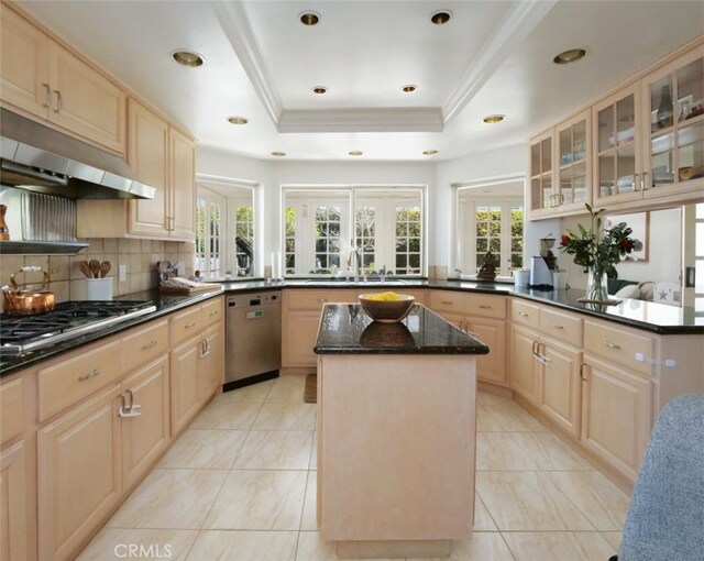 49 Country Ln, Rolling Hills Estates, CA 90274 - kitchen featuring a raised ceiling, light brown cabinetry, a center island, under cabinet range hood, and stainless steel appliances