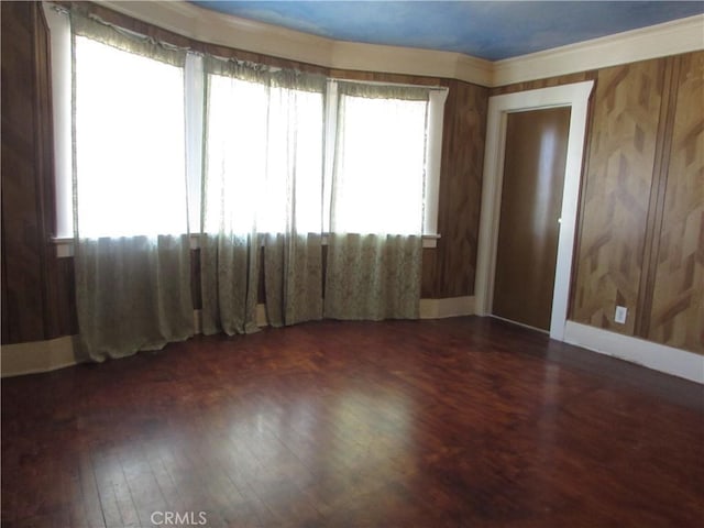 2956 W 15th St, Los Angeles, CA 90006 - unfurnished room featuring wood finished floors and baseboards