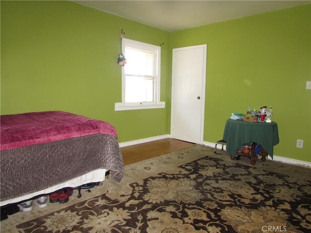2956 W 15th St, Los Angeles, CA 90006 - bedroom featuring baseboards and wood finished floors