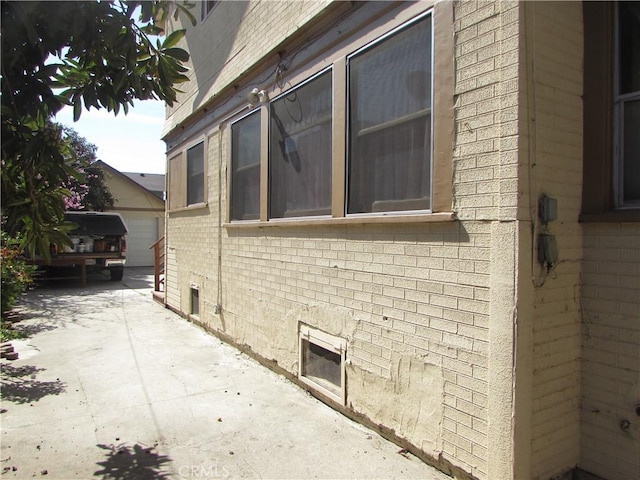 2956 W 15th St, Los Angeles, CA 90006 - view of property exterior featuring brick siding