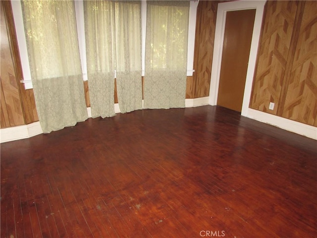 2956 W 15th St, Los Angeles, CA 90006 - empty room featuring baseboards and hardwood / wood-style flooring