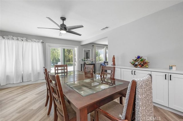 11911 Ivy Ln, Moreno Valley, CA 92557 - dining room featuring light wood-style flooring and ceiling fan