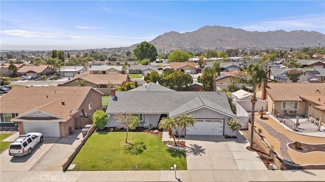 aerial view with a residential view and a mountain view