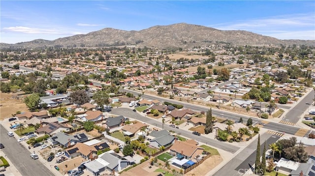 aerial view with a mountain view and a residential view