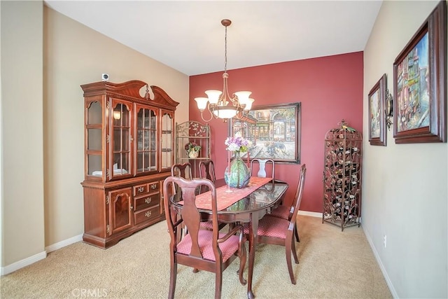 31973 Wildwood Ct, Temecula, CA 92592 - dining space featuring a chandelier, light carpet, and baseboards