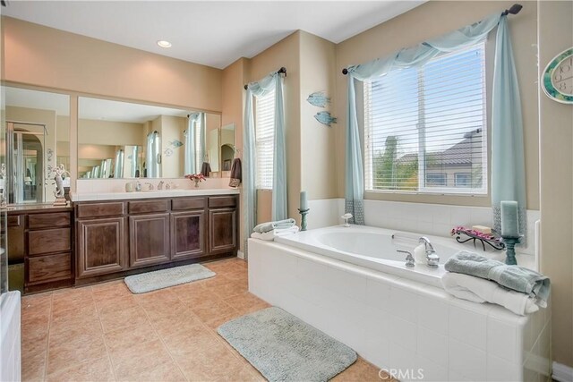 31973 Wildwood Ct, Temecula, CA 92592 - bathroom featuring a garden tub and double vanity
