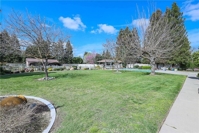 view of yard featuring fence