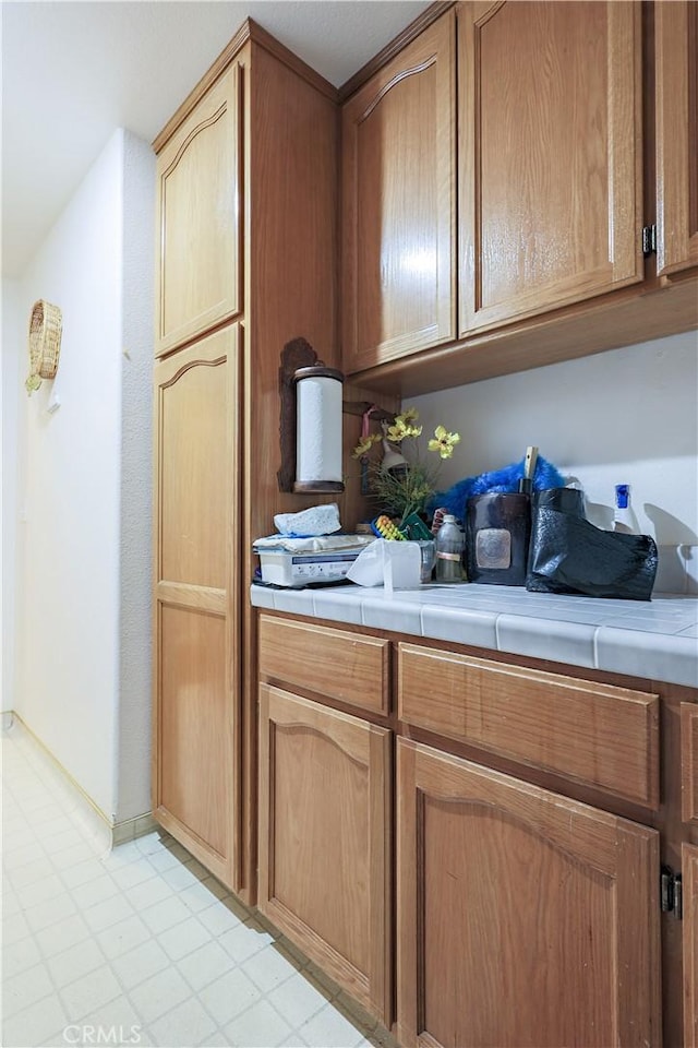 kitchen featuring tile countertops