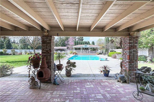 view of pool with a patio area, a fenced in pool, fence private yard, and a yard