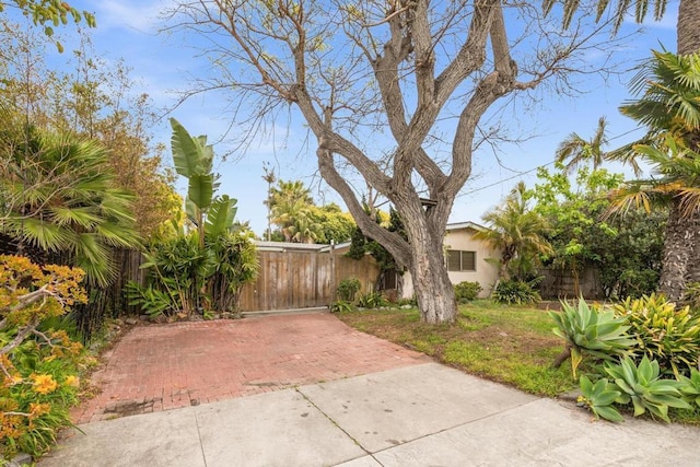 view of patio featuring fence