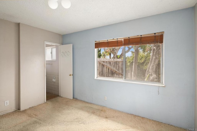 unfurnished bedroom with carpet