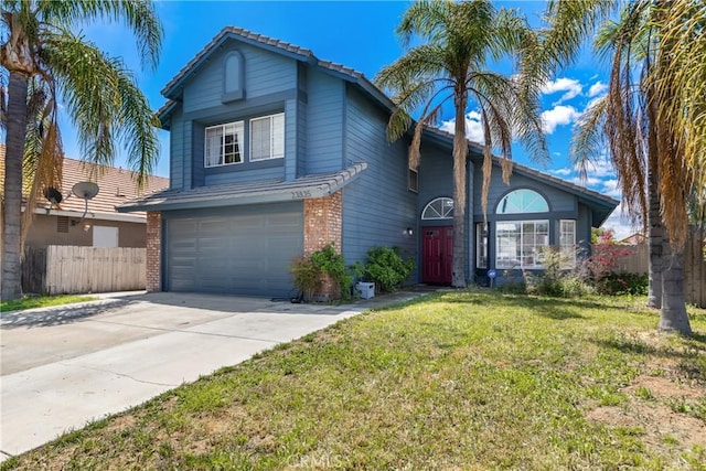 view of front of property featuring driveway, brick siding, fence, a front lawn, and an attached garage
