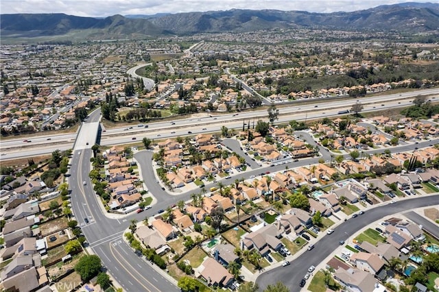 bird's eye view featuring a residential view and a mountain view