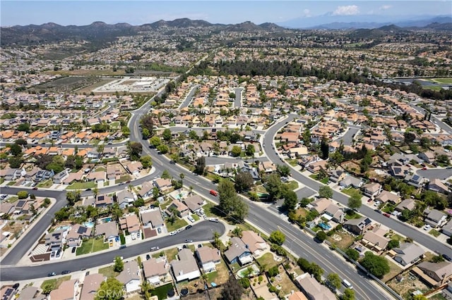 birds eye view of property with a residential view and a mountain view