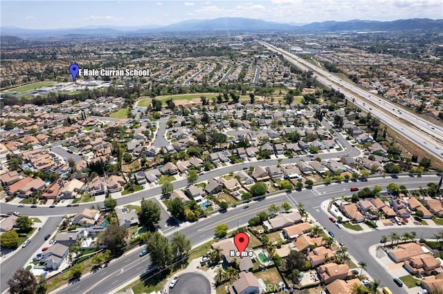 bird's eye view with a residential view and a mountain view
