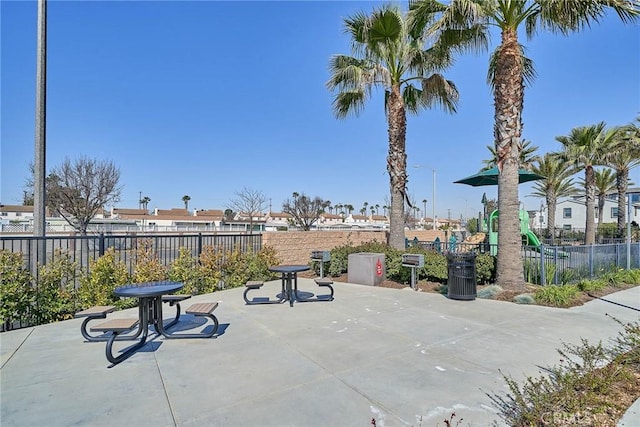 view of patio featuring fence
