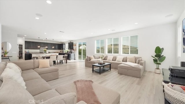 35461 Alexandria Way, Beaumont, CA 92223 - living room with light wood finished floors and recessed lighting