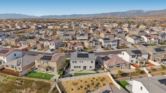 aerial perspective of suburban area featuring mountains