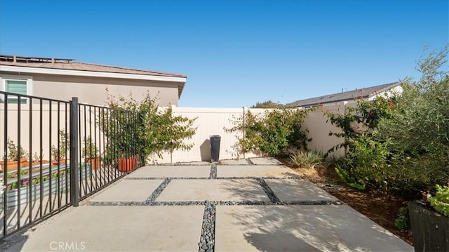 view of patio featuring a fenced backyard